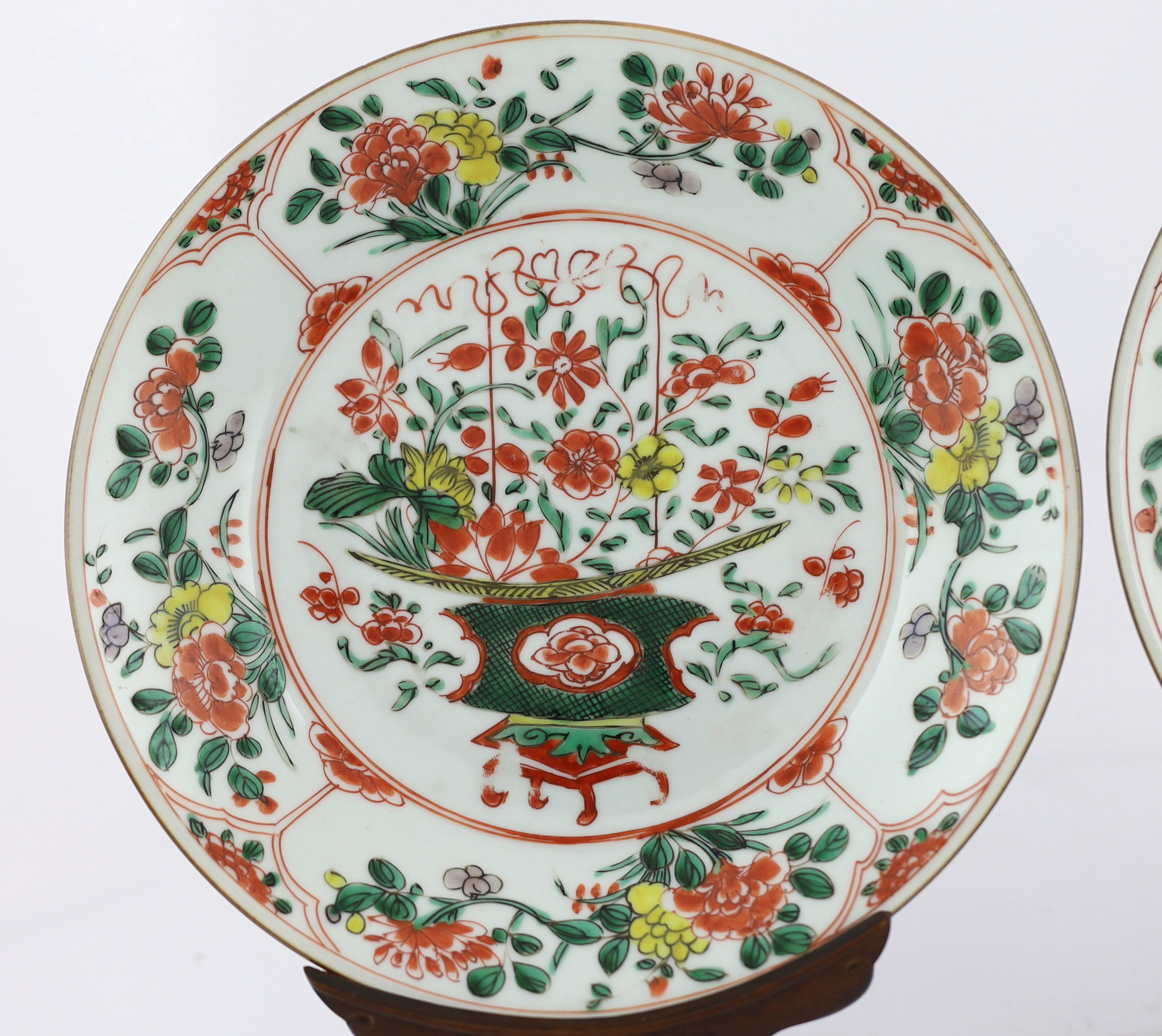 A pair of Chinese famille verte dishes, Kangxi/Yongzheng period, hairline cracks